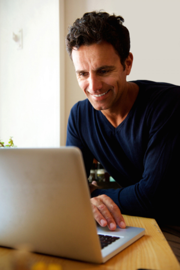 Man researching retirement consolidation