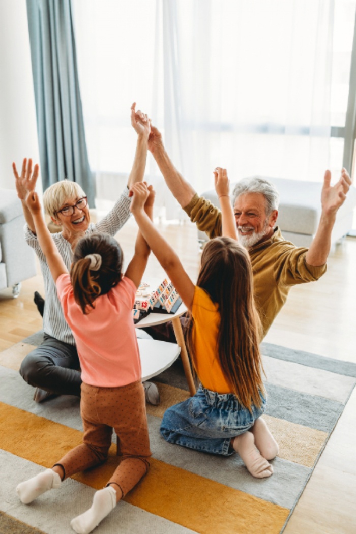 Grandparents playing with their grandchildren