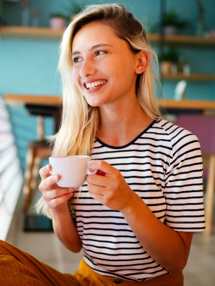 Woman with a cup of coffee