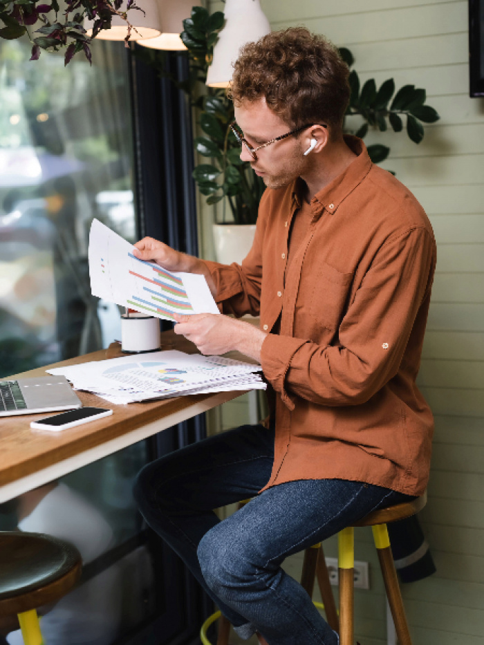 Young worker looking at paperwork