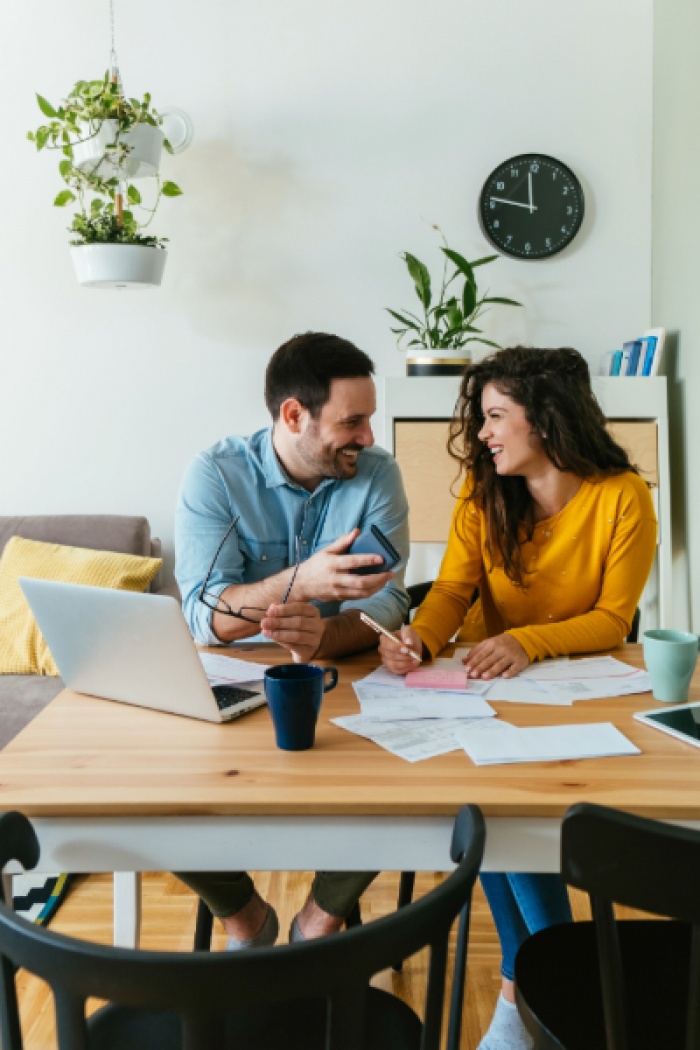 Couple at home discussing finances