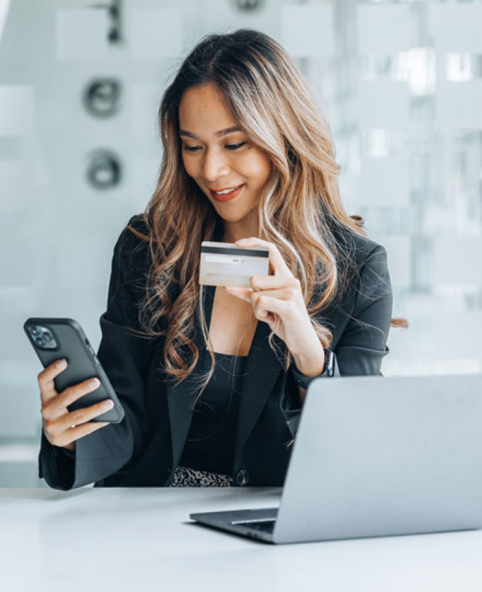 Business owner shopping with company credit card.