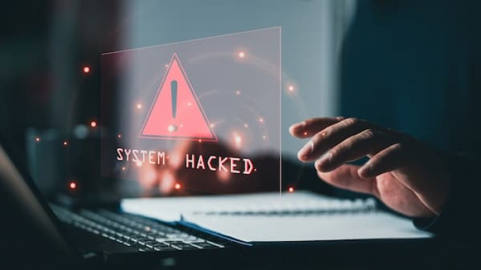system hacked warning on laptop