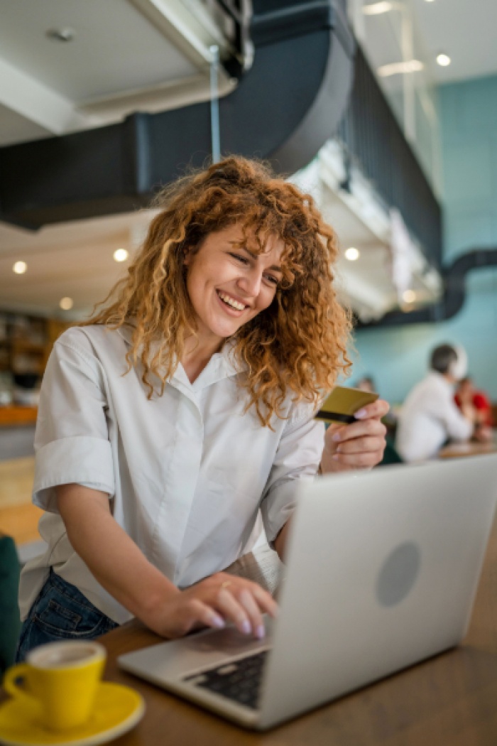 Woman reading her credit card