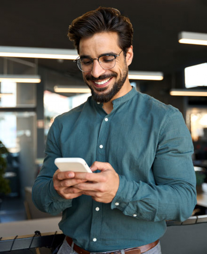 Man reviewing his account using the digital banking app.