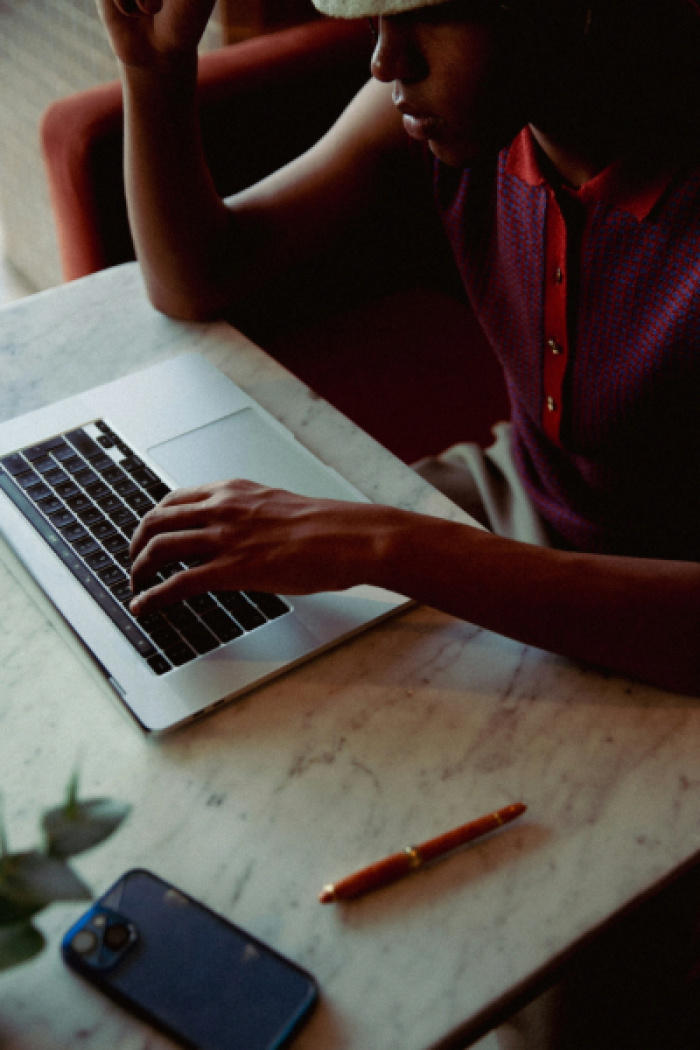 Small business owner on l aptop