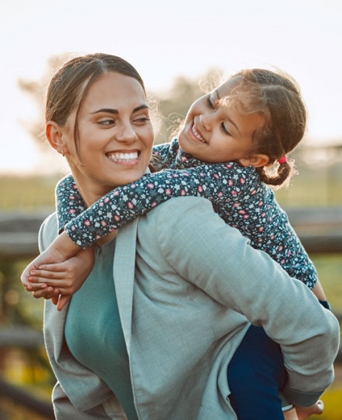 Mother spending time with daughter, thinking of the future.