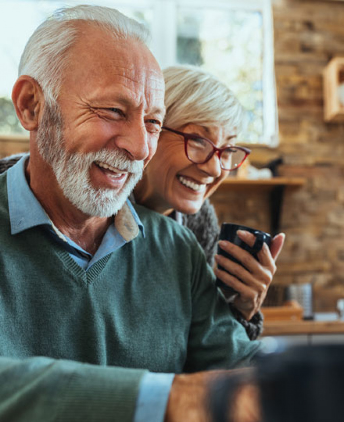 Older couple reviewing their finances.