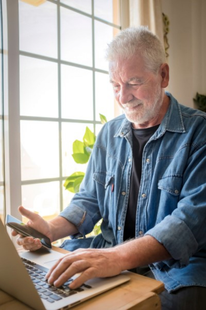 Older man on laptop