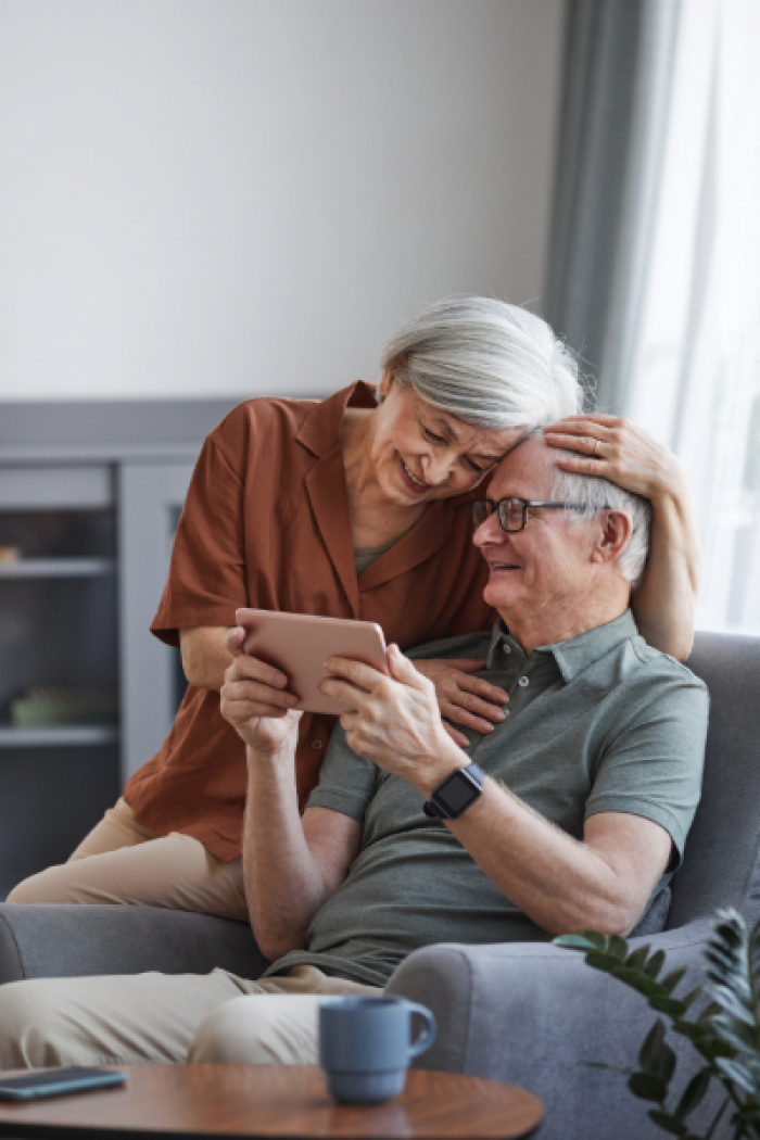 Happy retired couple smiling