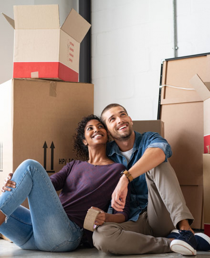 Happy couple enjoying their new home.