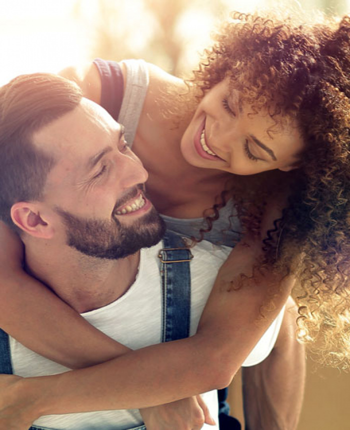 Couple smiling at each other