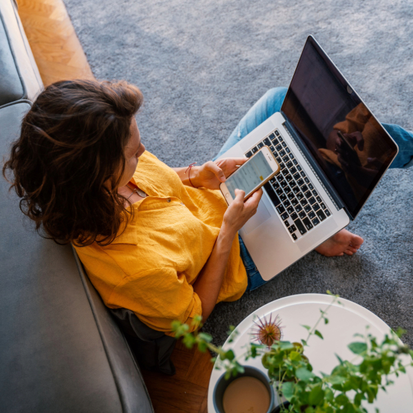 Woman at home on her laptop