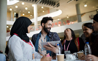 Group of coworkers laughing