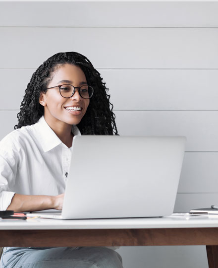 Woman reading that she had been approved for a personal loan.