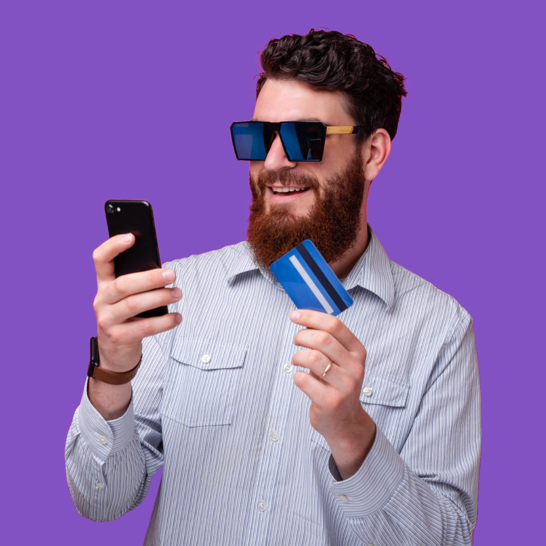 Man on phone with credit card