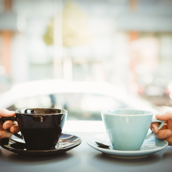 Members enjoying coffee and their shared savings.